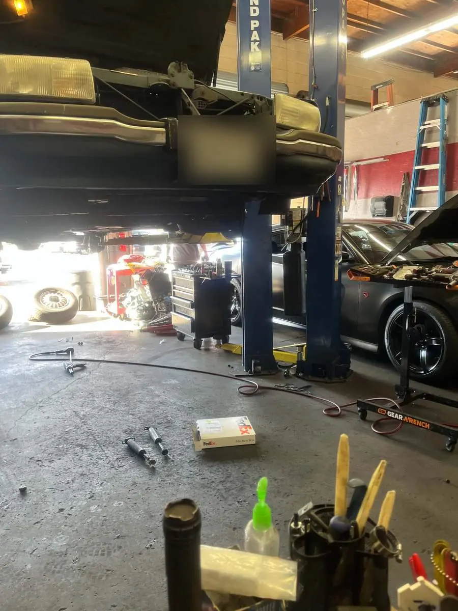 Two-post lift mid job