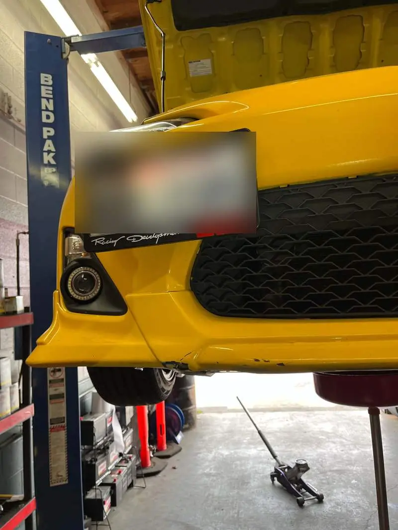 Sport coupe on the lift